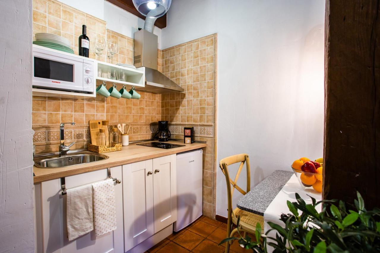 Apartamentos Puente De La Juderia Hervas Bagian luar foto